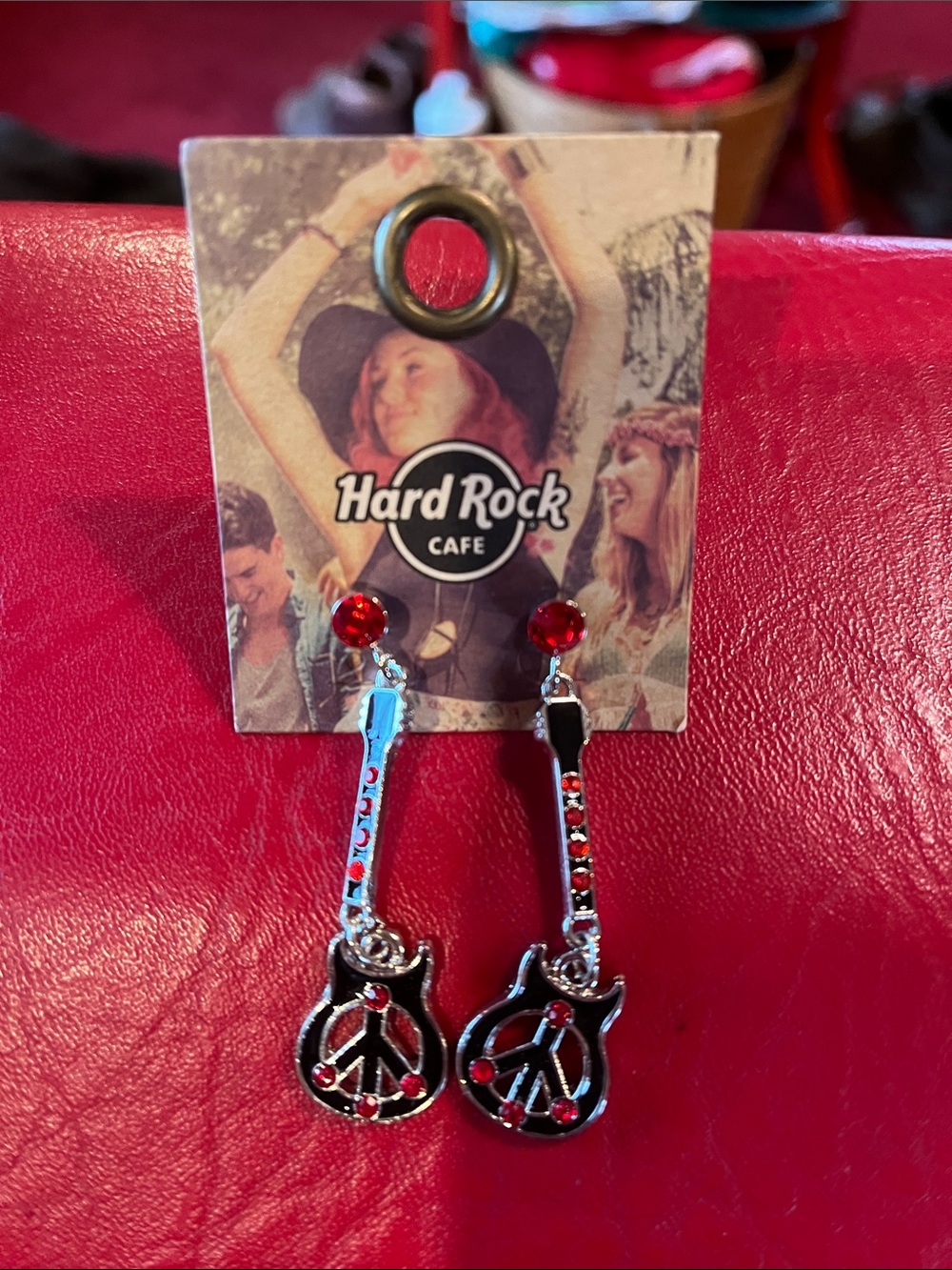 Hard Rock Cafe Silver Guitar Peace Sign Drop Earrings with Red Accents